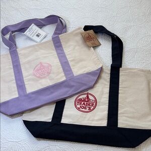 2 Trader Joe's Springtime Canvas Tote Bags 1 with Lavender and 1 Navy Trim.